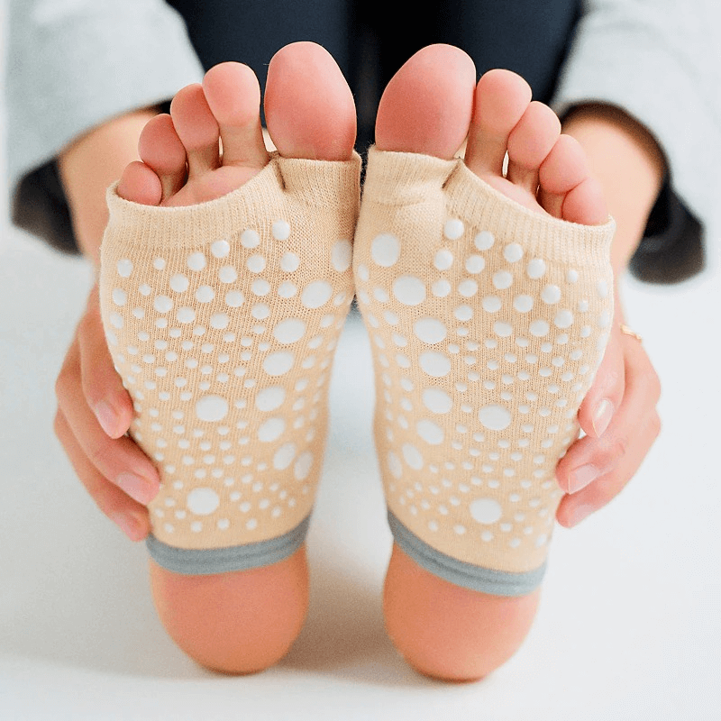 Women's open toe non-slip yoga socks with silicone sole for stability and comfort, perfect for yoga and fitness.